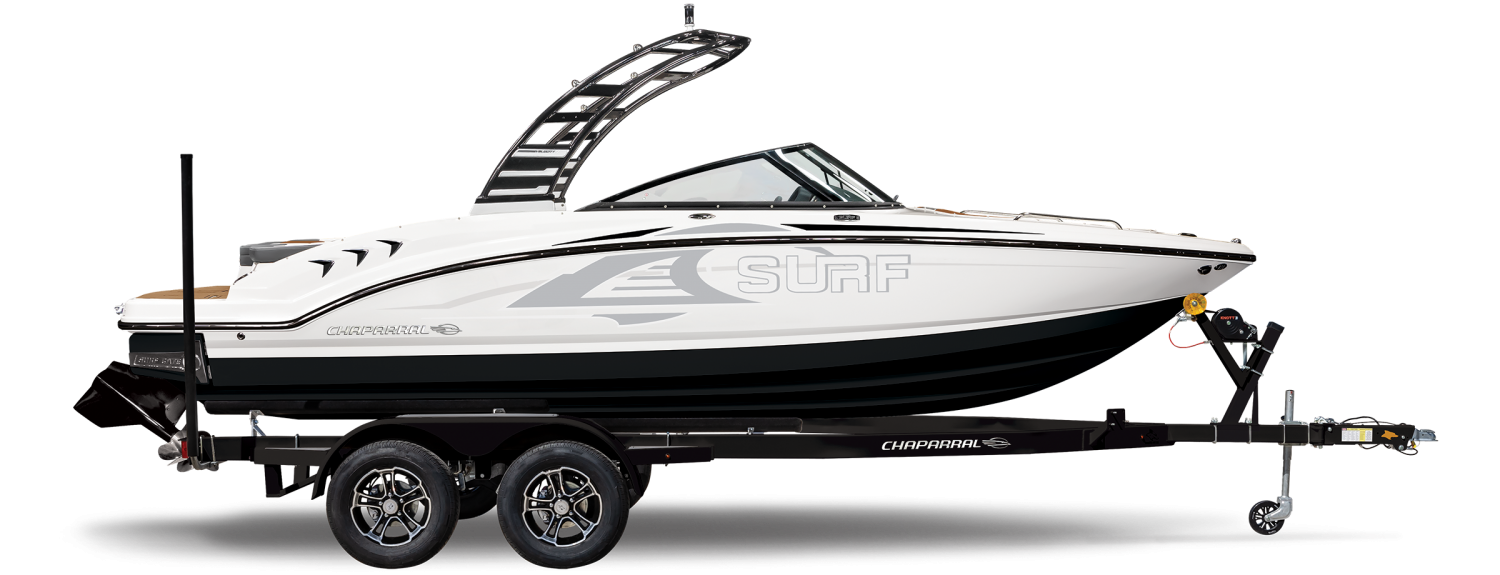 Navy blue and white wakesurf boat side view